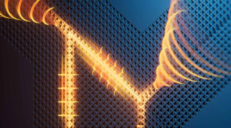 Glowing orange light waves travel along and bend around a geometric, triangular-patterned surface, illustrating researchers guiding light through a structured material to form a 6G terahertz “super-antenna.”