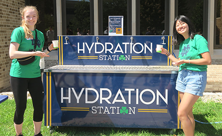 Students staff a hydration station during Welcome Weekend.
