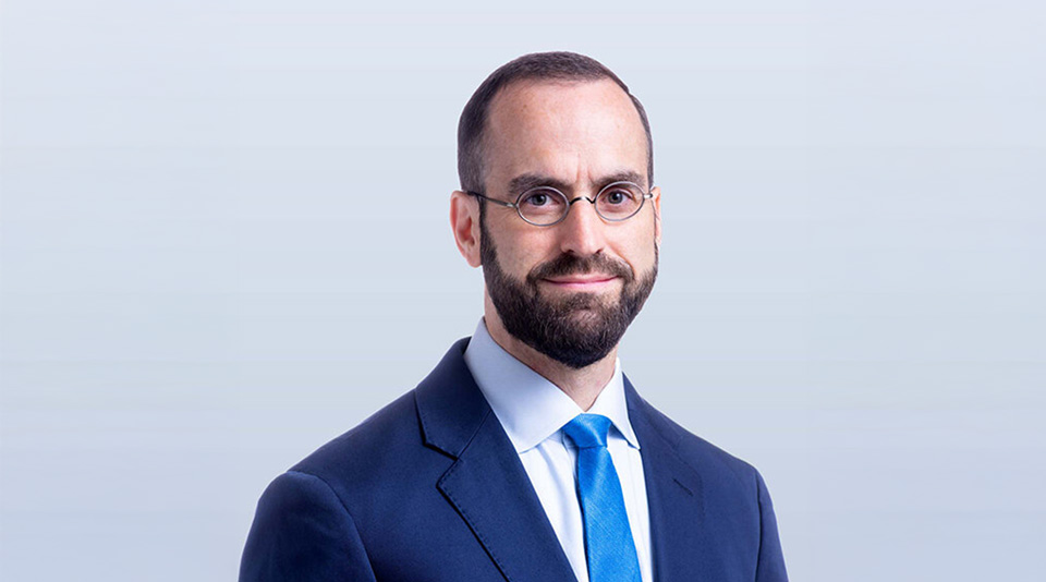 Portrait of Jim Schmiedeler against a neutral background
